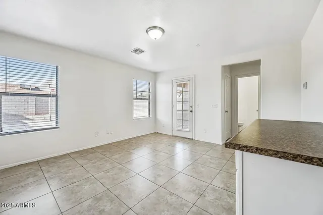 a view of a kitchen cabinets
