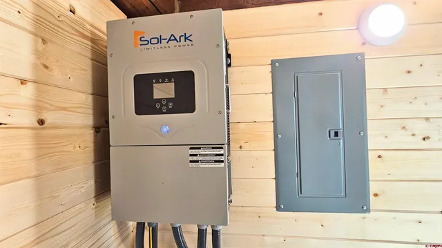 a view of a wooden door and a window of the house