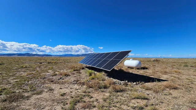 a view of stairs and wooden floor