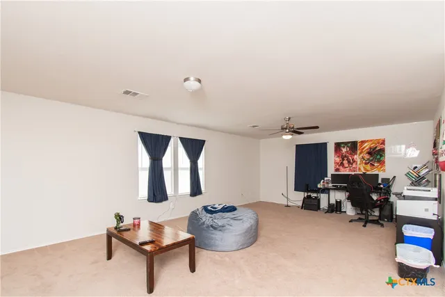 a room with toys and lounge chair