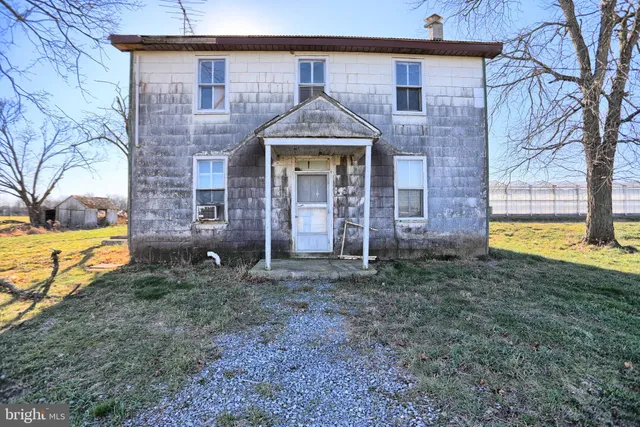 a view of a lake with a yard