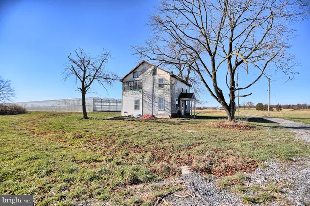 a view of a lake with a big yard