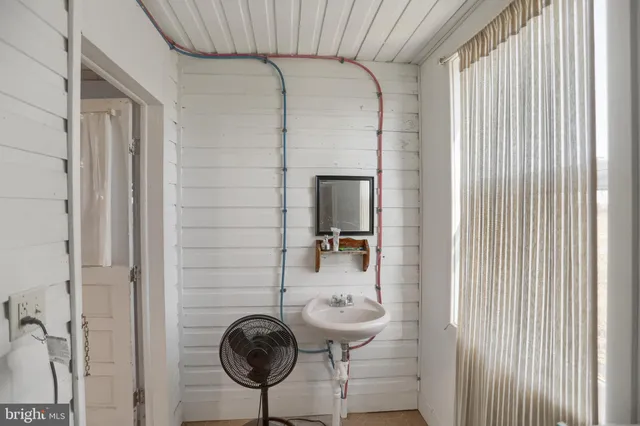 a view of balcony with wooden floor