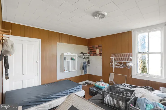 an aerial view of a house having yard and a big yard