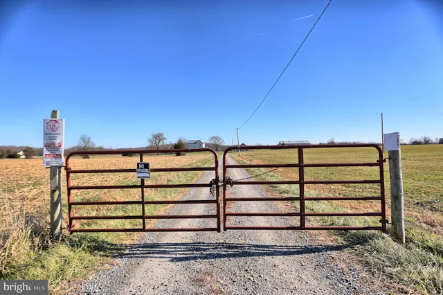 a view of a room with wooden walls