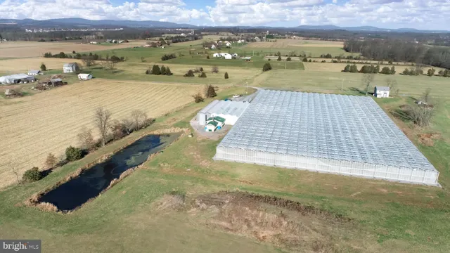a view of a lake with building in front of it