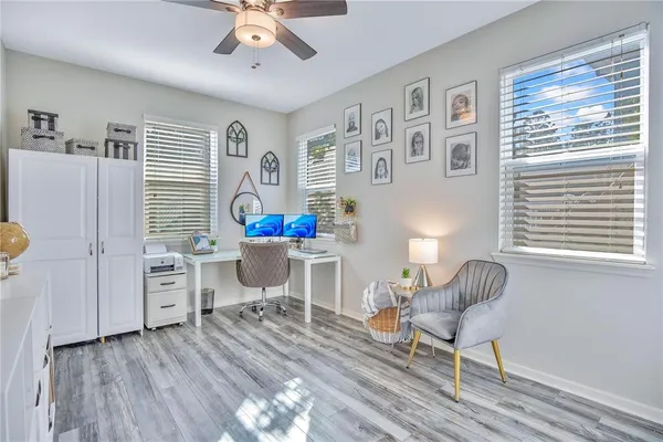 a living room with furniture and a window