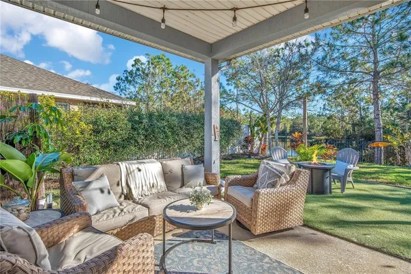 a outdoor living space with furniture and garden view