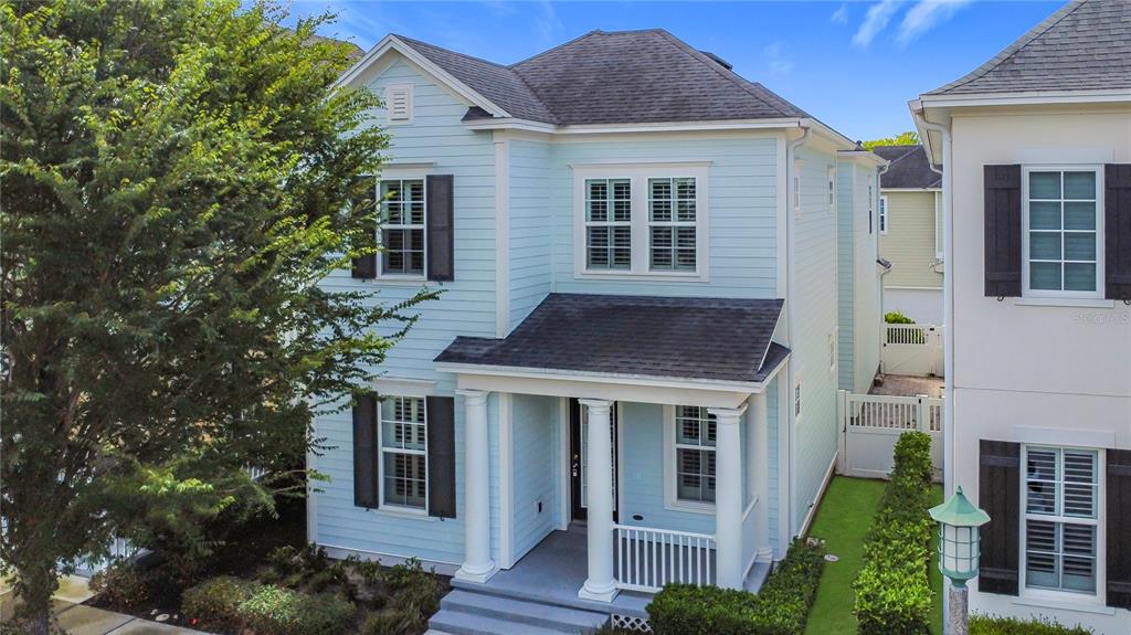 1513 Resolute Street Celebration, FL 34747 - Photo 2 of 43 a house view with a garden space