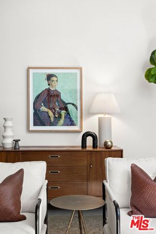 a living room with hard wood flooring