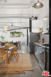 a view of small shop with a lot of signs