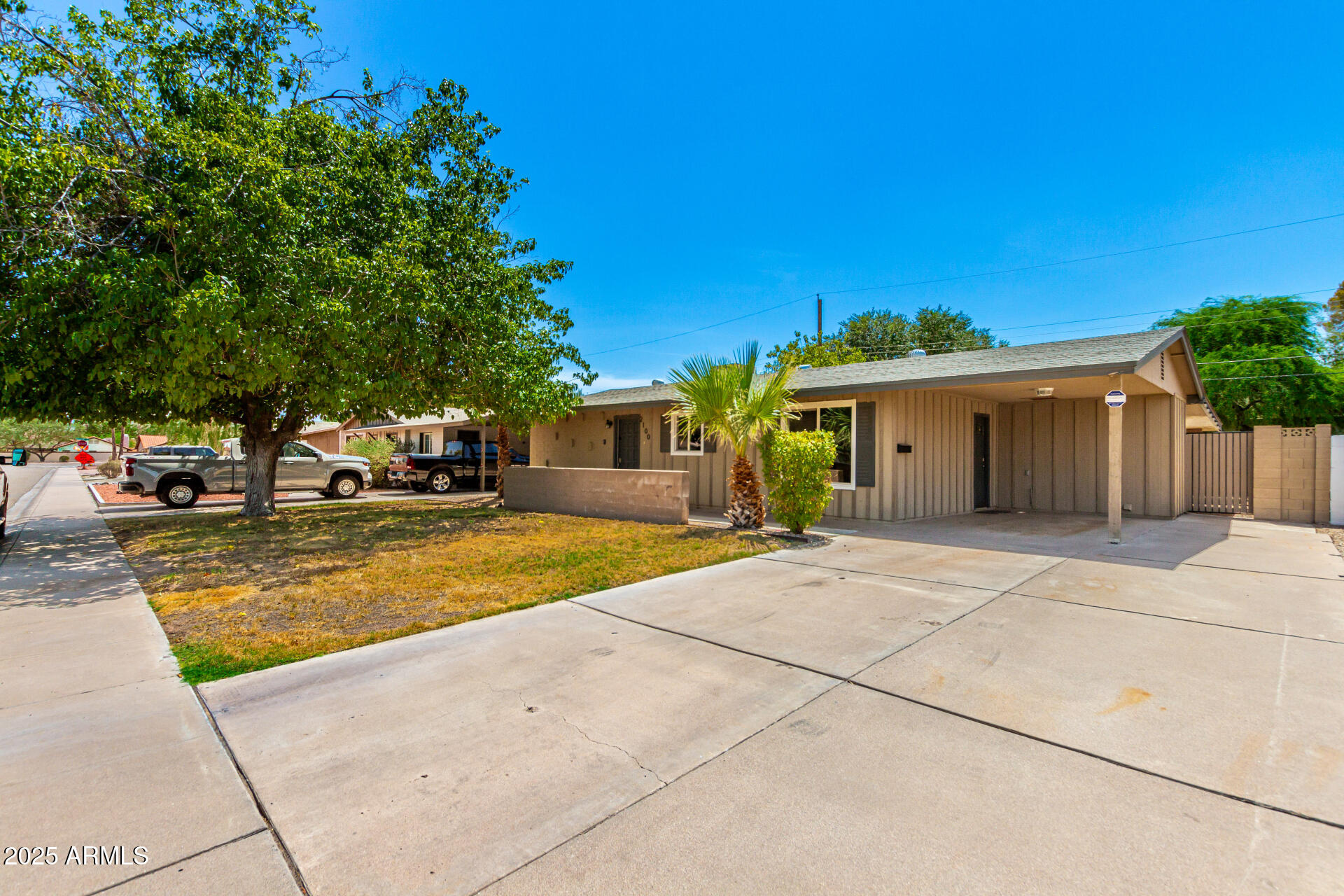 2100 North Normal Avenue Tempe, AZ 85288 - Photo 1 of 51 a view of a house with large outdoor space and sitting area