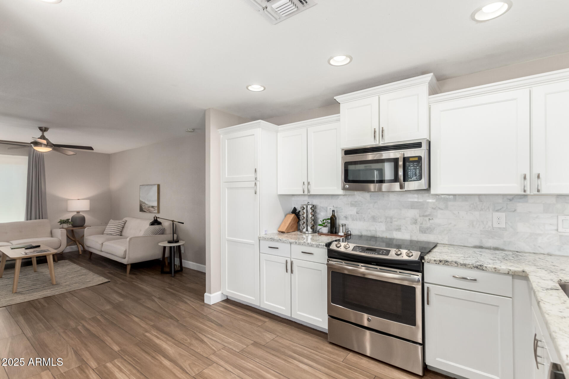 2100 North Normal Avenue Tempe, AZ 85288 - Photo 12 of 51 a kitchen with sink cabinets and appliances