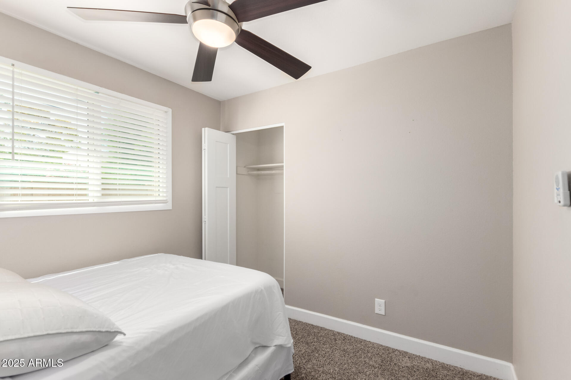 2100 North Normal Avenue Tempe, AZ 85288 - Photo 14 of 51 a bedroom with a bed and a window