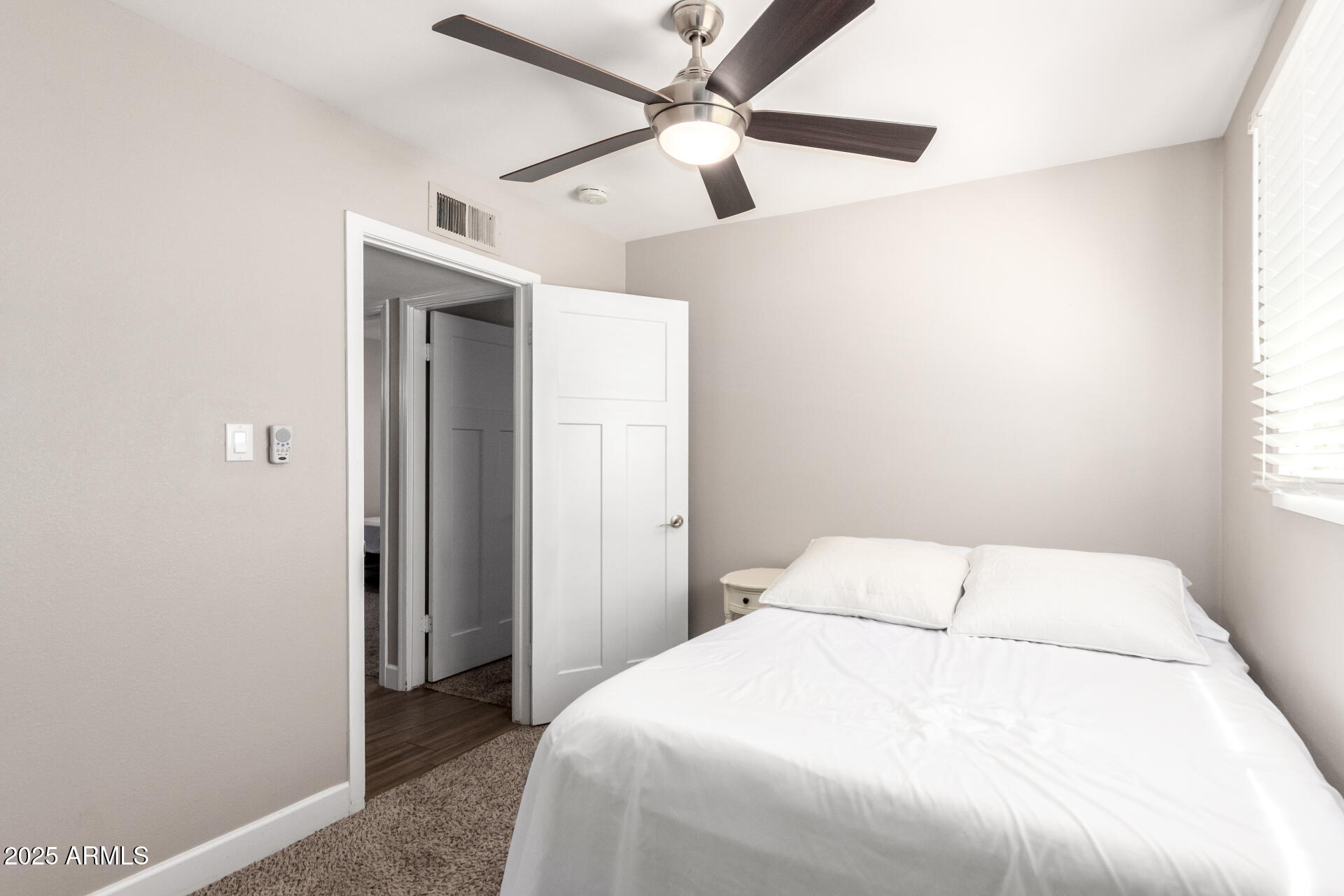 2100 North Normal Avenue Tempe, AZ 85288 - Photo 15 of 51 a bedroom with a bed and a ceiling fan