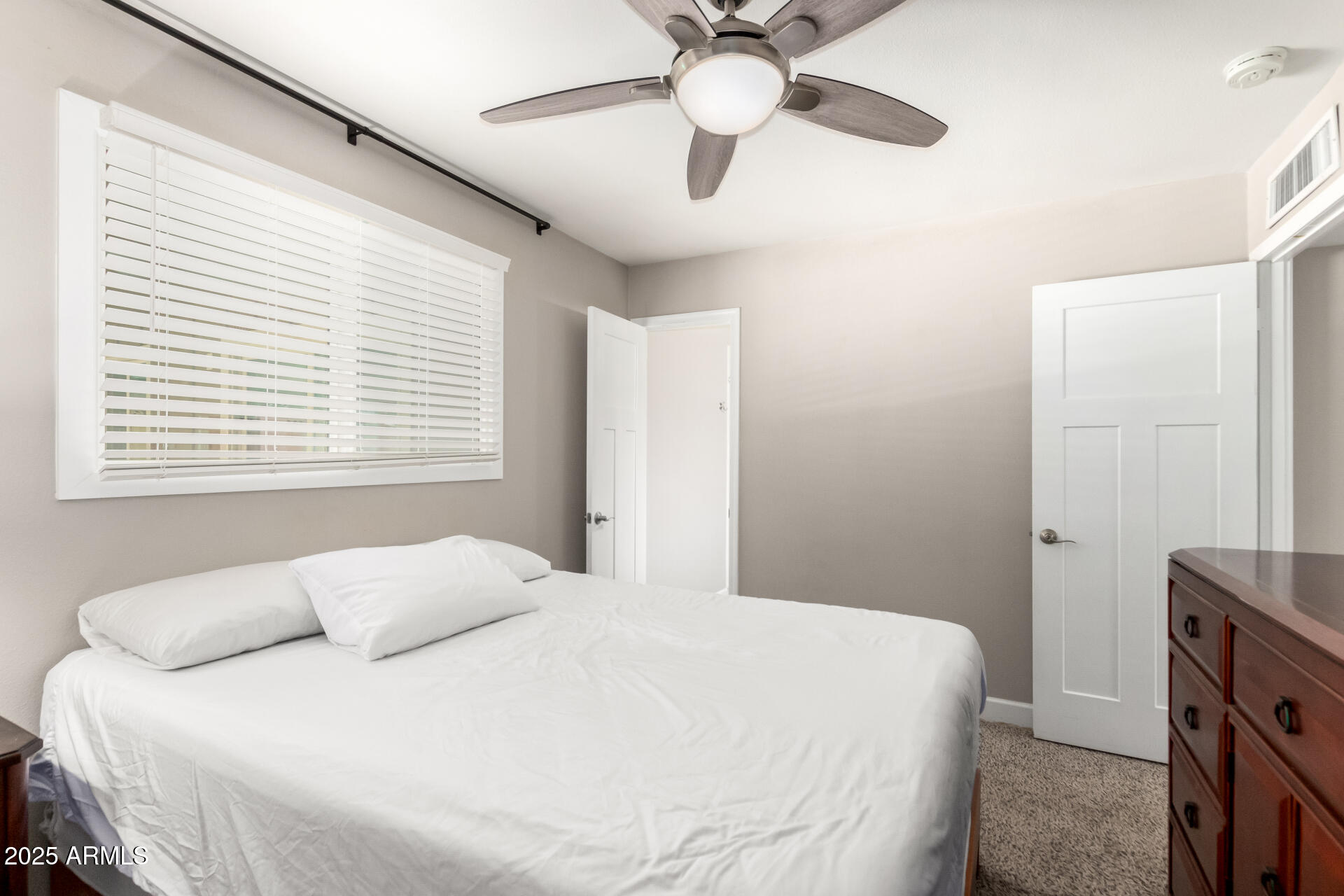 2100 North Normal Avenue Tempe, AZ 85288 - Photo 19 of 51 a bedroom with a bed and a window