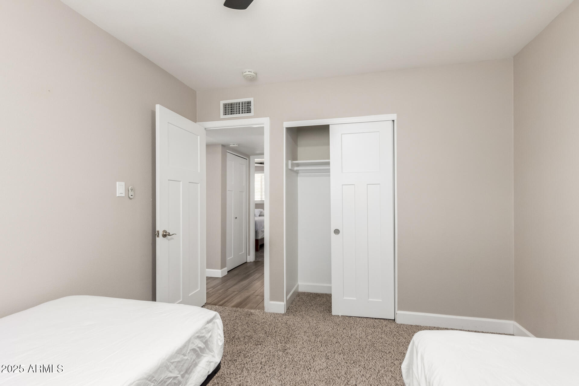 2100 North Normal Avenue Tempe, AZ 85288 - Photo 22 of 51 a bedroom with a bed and hallway
