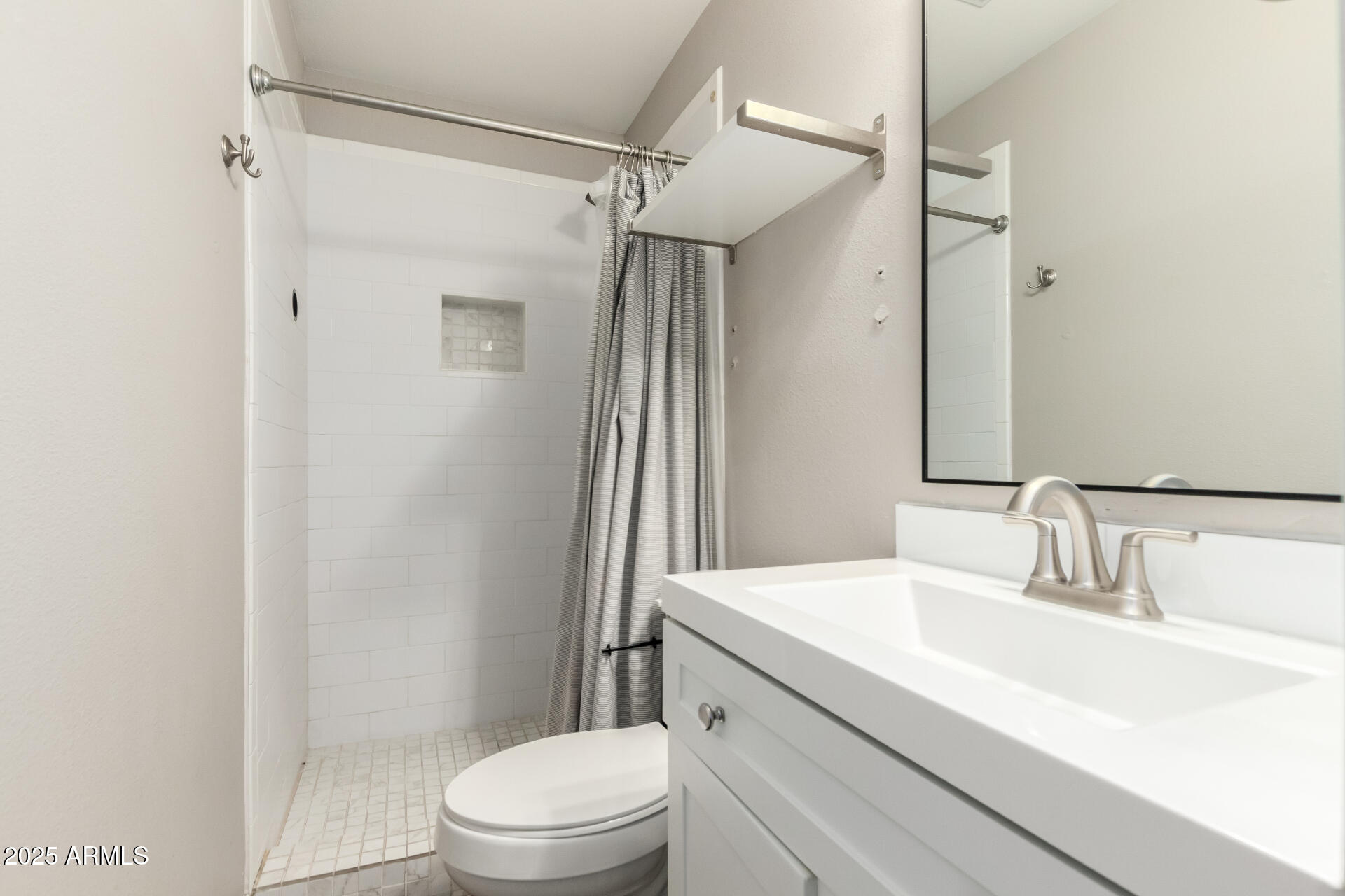 2100 North Normal Avenue Tempe, AZ 85288 - Photo 25 of 51 a bathroom with a sink a toilet a mirror and shower