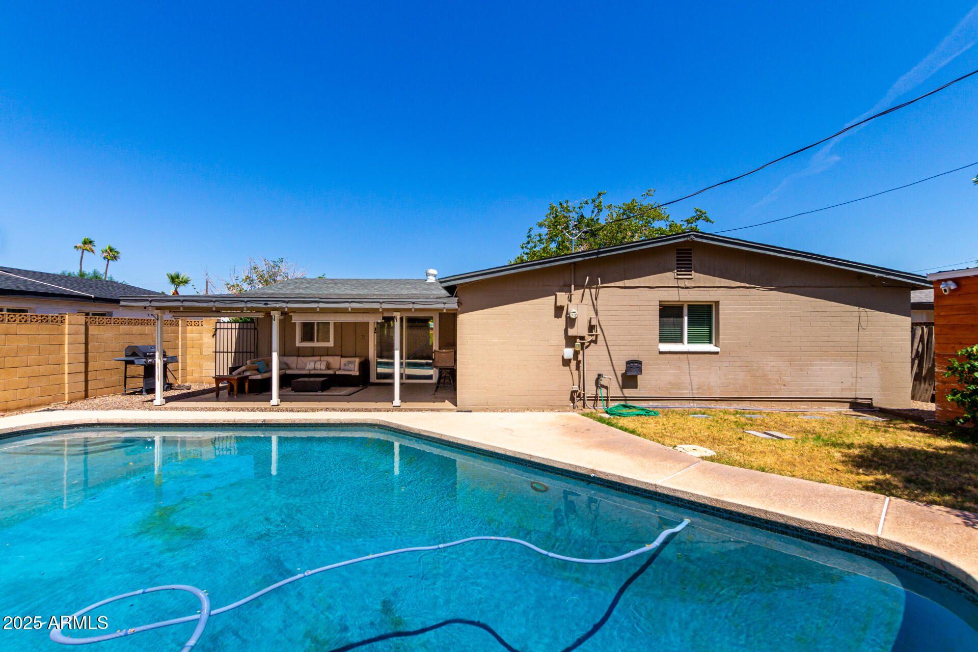 2100 North Normal Avenue Tempe, AZ 85288 - Photo 30 of 51 a view of a house with pool and sitting area