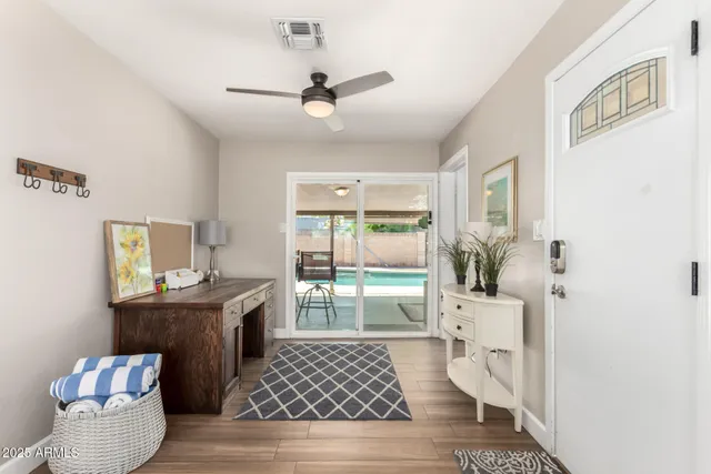 a living room with furniture and a window