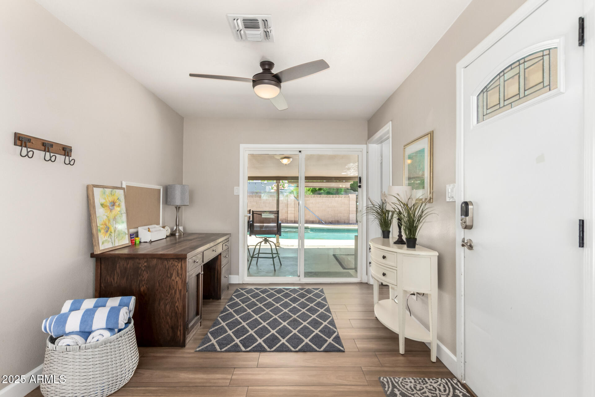 2100 North Normal Avenue Tempe, AZ 85288 - Photo 4 of 51 a living room with furniture and a window