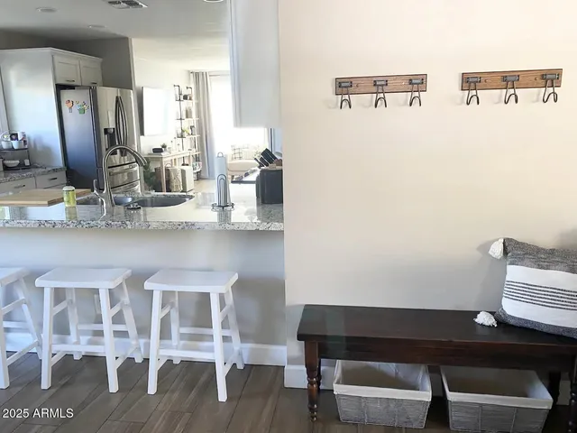 a kitchen with granite countertop a sink and a granite counter tops