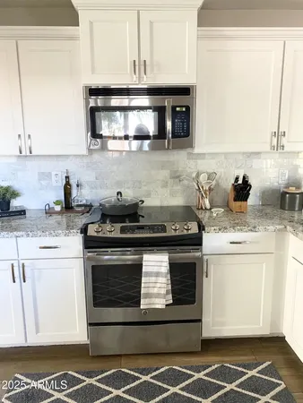 a kitchen with sink and window