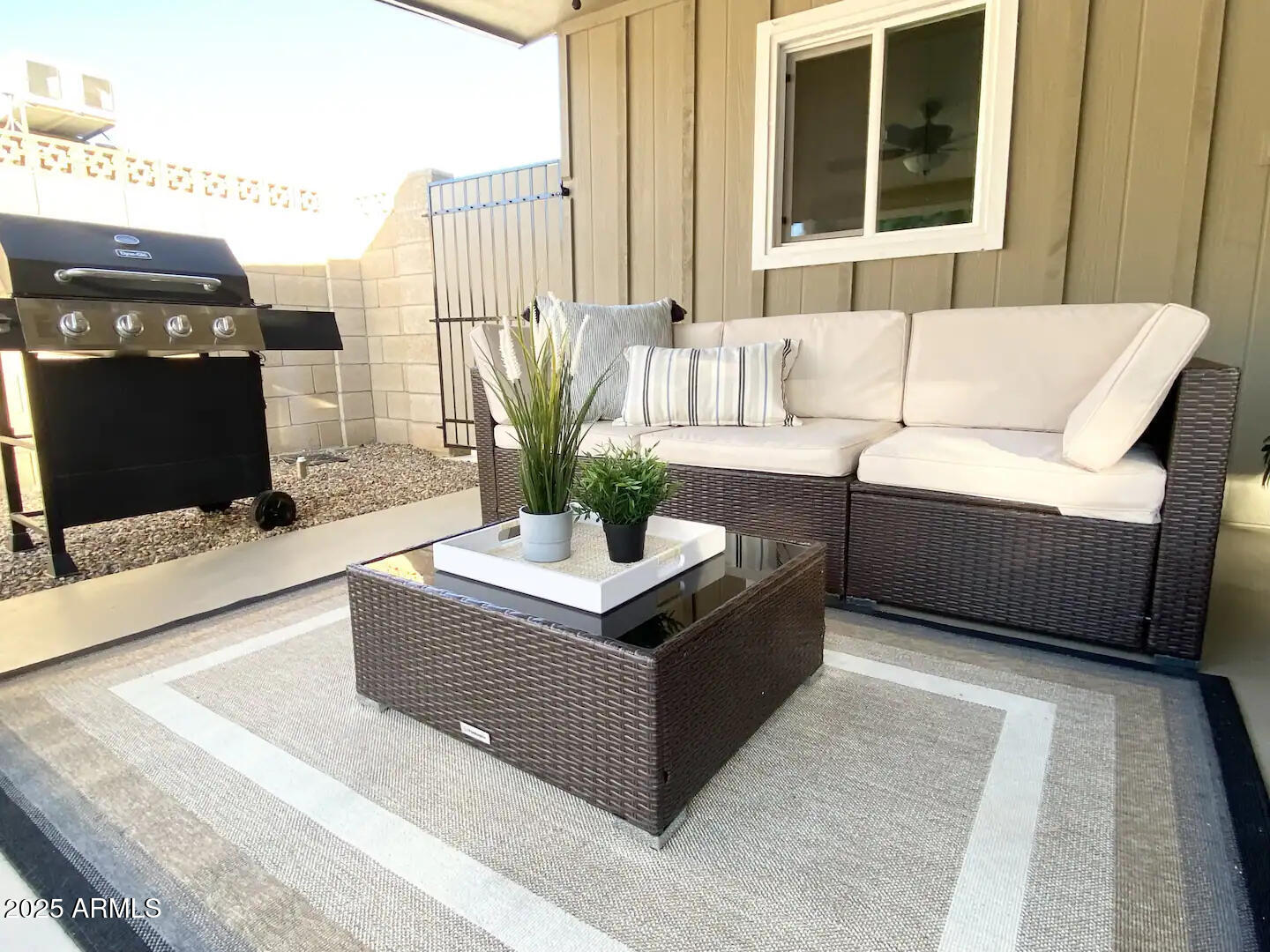 2100 North Normal Avenue Tempe, AZ 85288 - Photo 48 of 51 a living room with couches and a flat screen tv