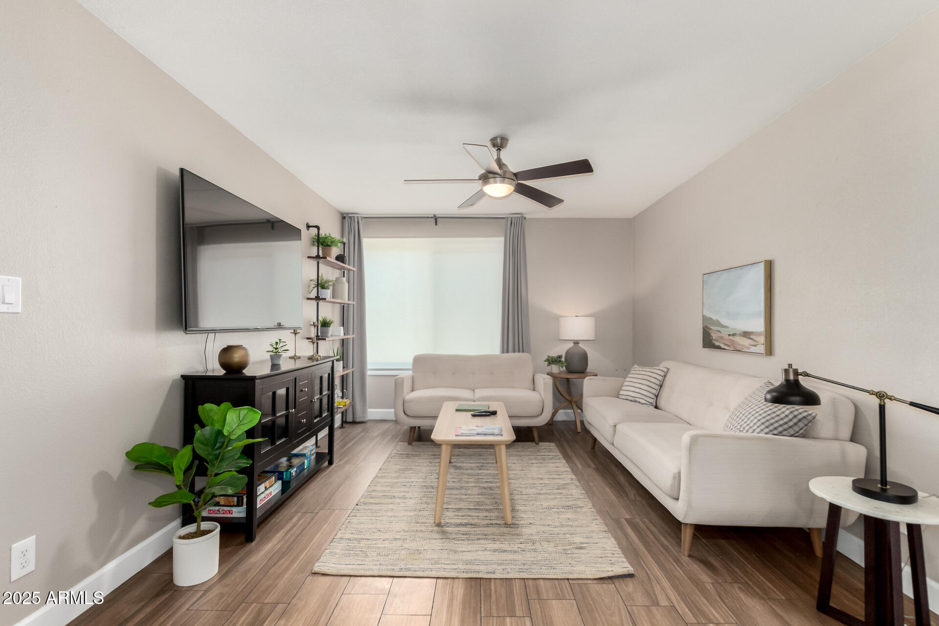 2100 North Normal Avenue Tempe, AZ 85288 - Photo 6 of 51 a living room with furniture and a flat screen tv