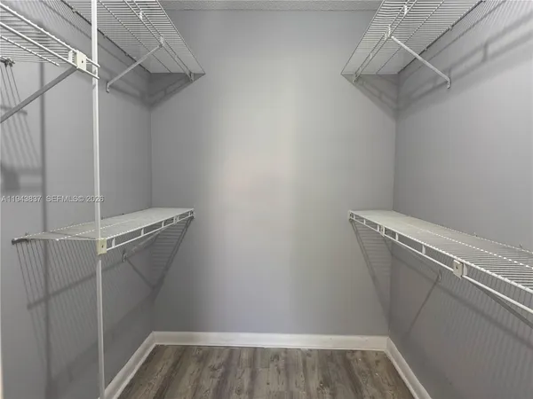 a view of a room with racks on the wall