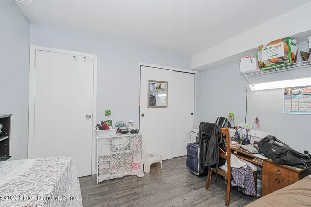 a room with furniture and wooden floor