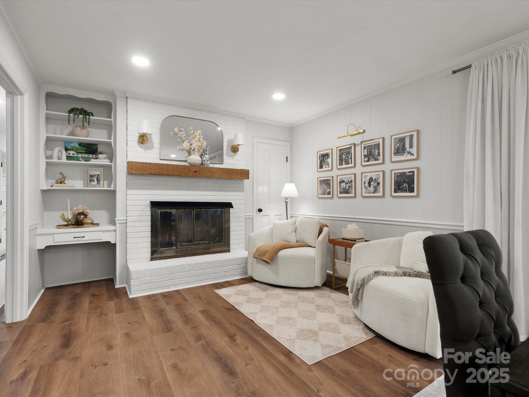 1102 Oak Hill Drive Monroe, NC 28112 - Photo 11 of 33 a living room with furniture and a fireplace