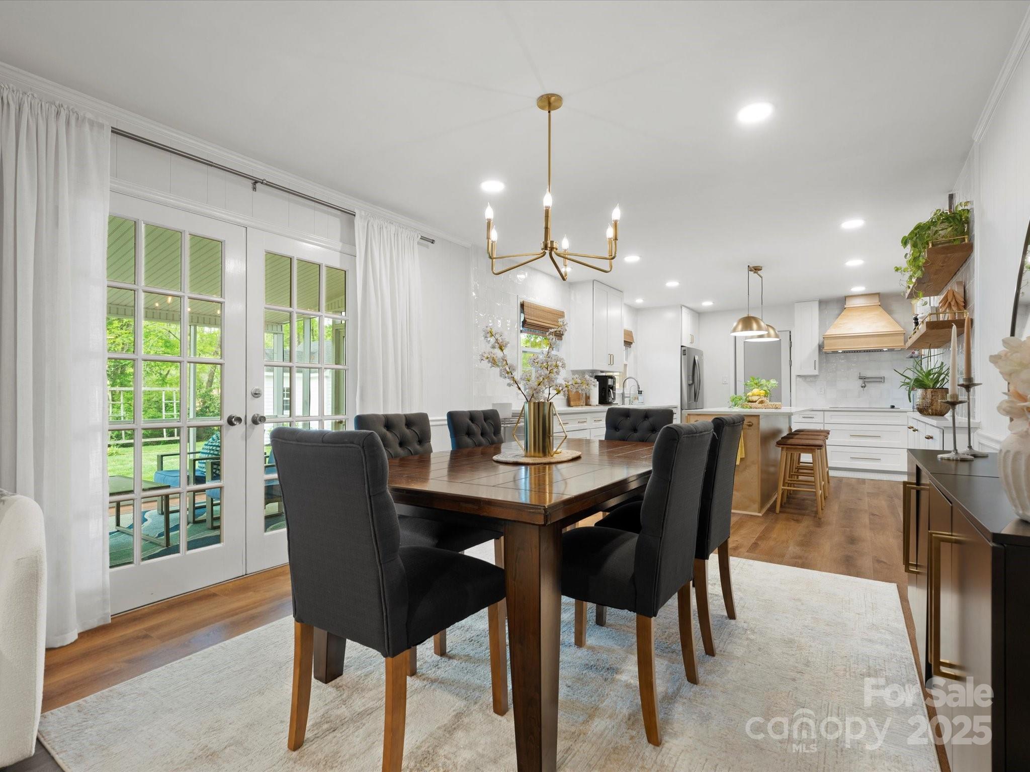 1102 Oak Hill Drive Monroe, NC 28112 - Photo 12 of 33 a view of a dining room with furniture window and outside view