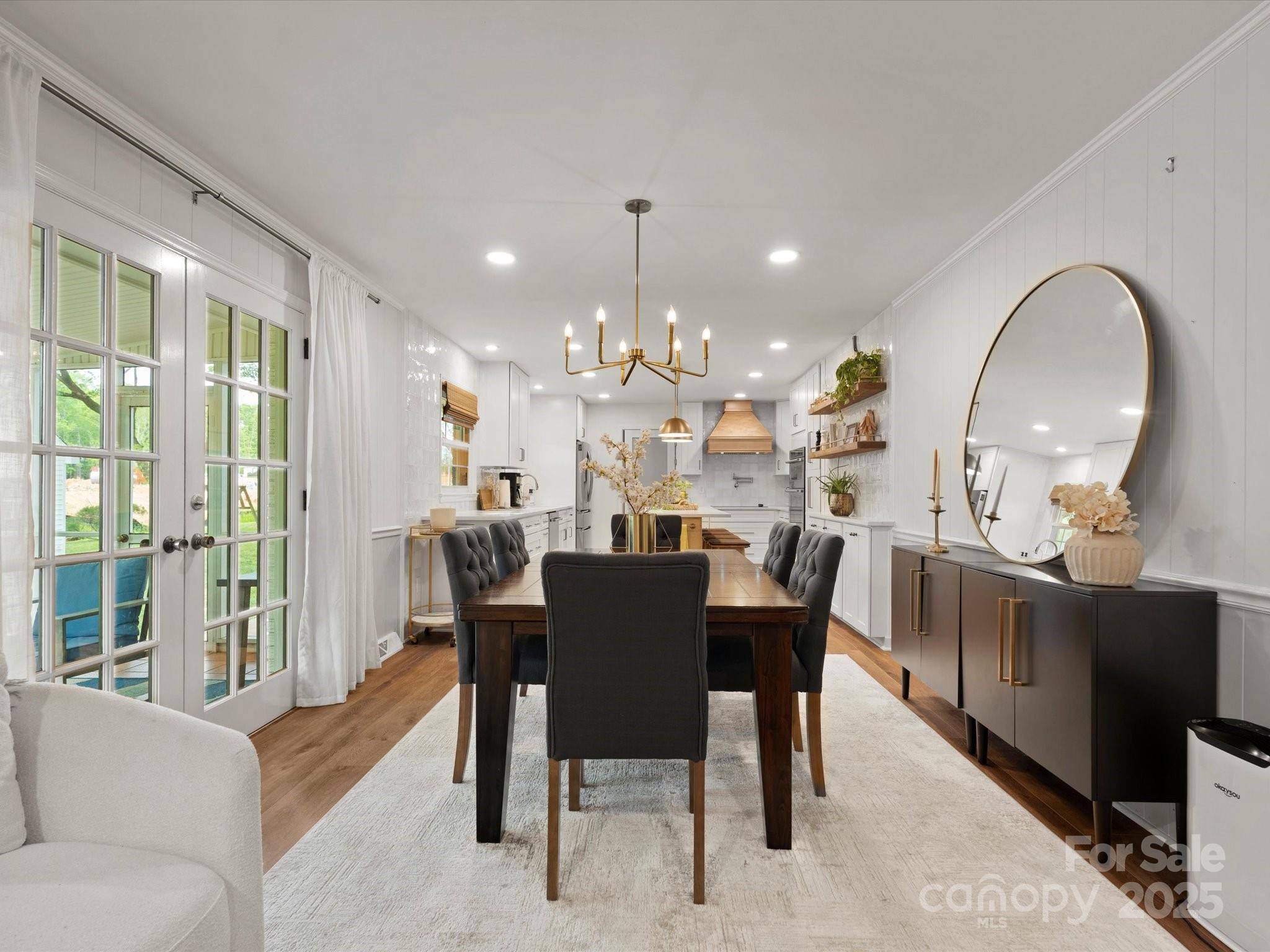1102 Oak Hill Drive Monroe, NC 28112 - Photo 23 of 33 a view of a dining room with furniture window and outside view