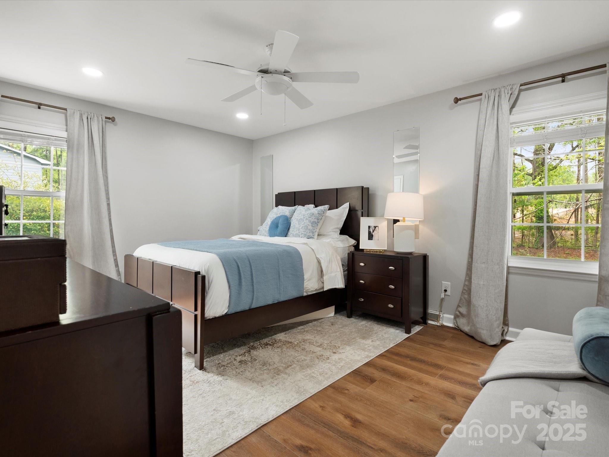 1102 Oak Hill Drive Monroe, NC 28112 - Photo 24 of 33 a bedroom with a bed and a window