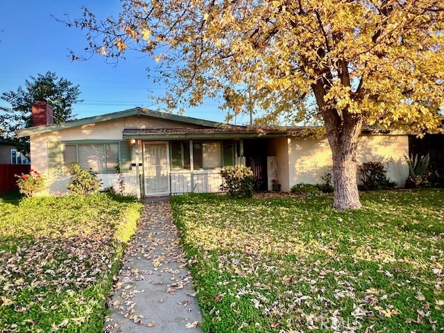 9621 South Mills Avenue Montclair, CA 91763 - Photo 1 of 1 a front view of a house with garden