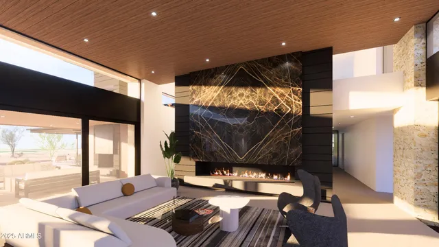 a living room with furniture and a floor to ceiling window