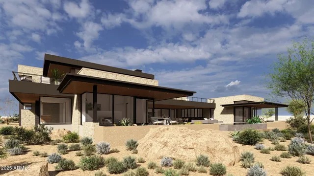 a front view of a house with a yard covered in snow