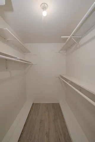 a view of a room with racks on the wall