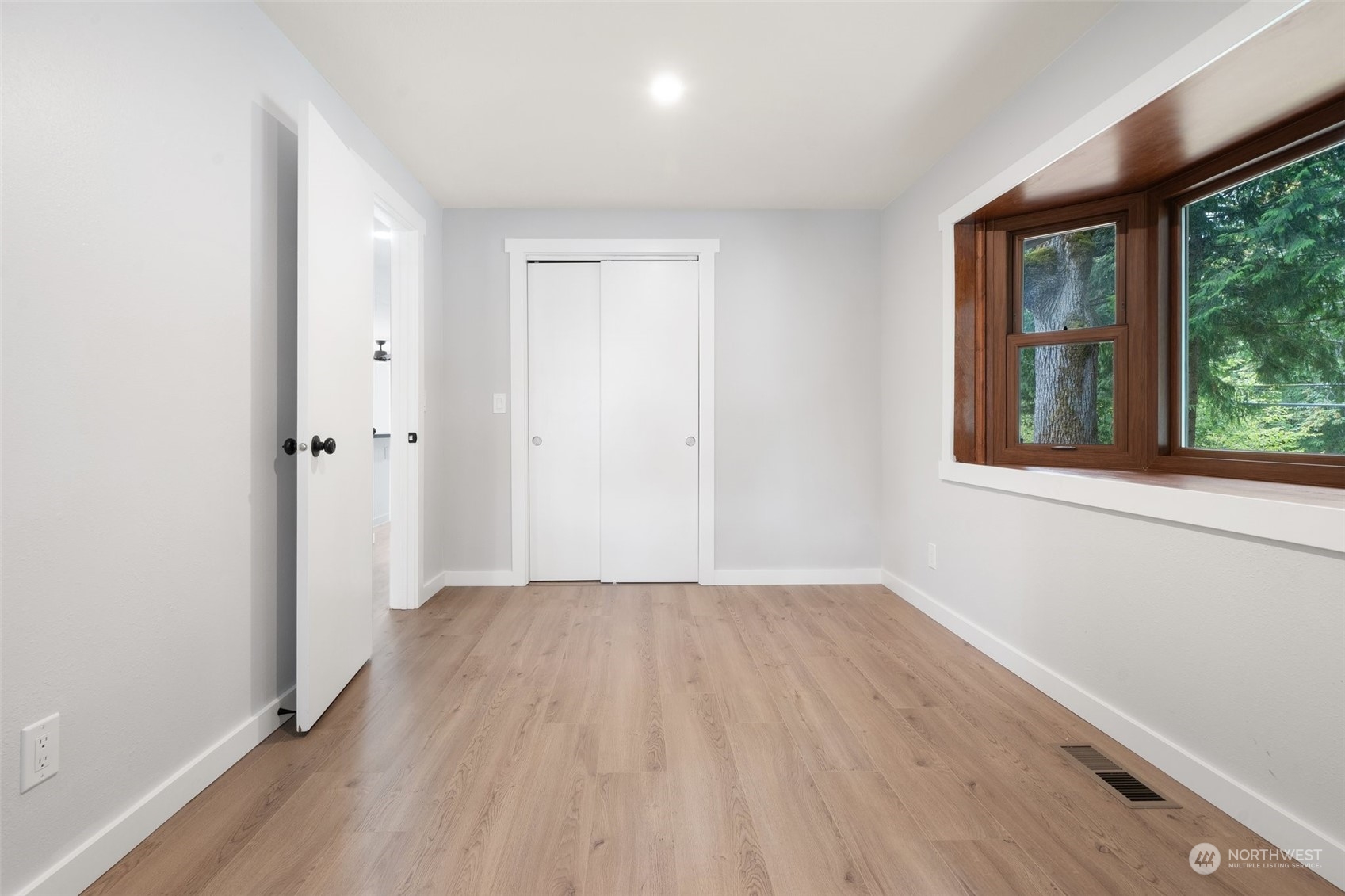 18832 196th Avenue Southeast Renton, WA 98058 - Photo 19 of 33 wooden floor in an empty room with a window