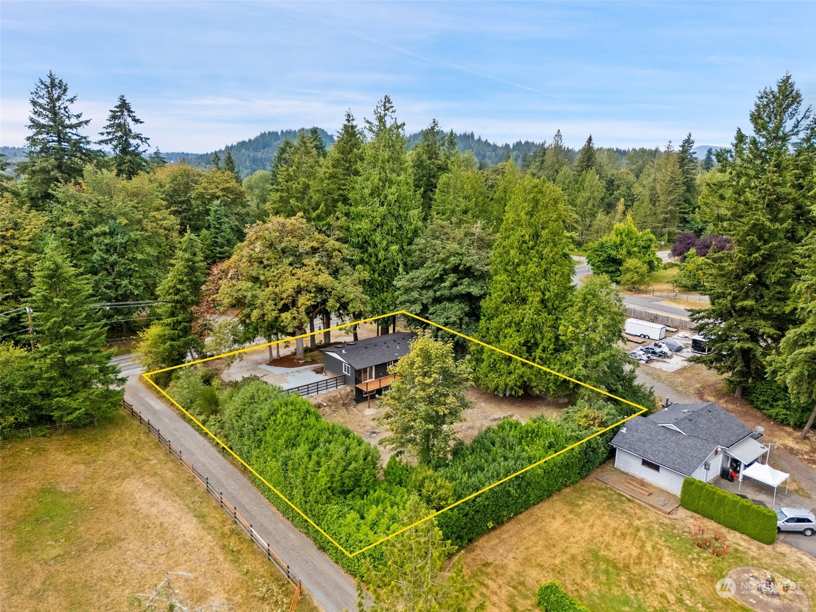 18832 196th Avenue Southeast Renton, WA 98058 - Photo 2 of 33 a view of a backyard with plants