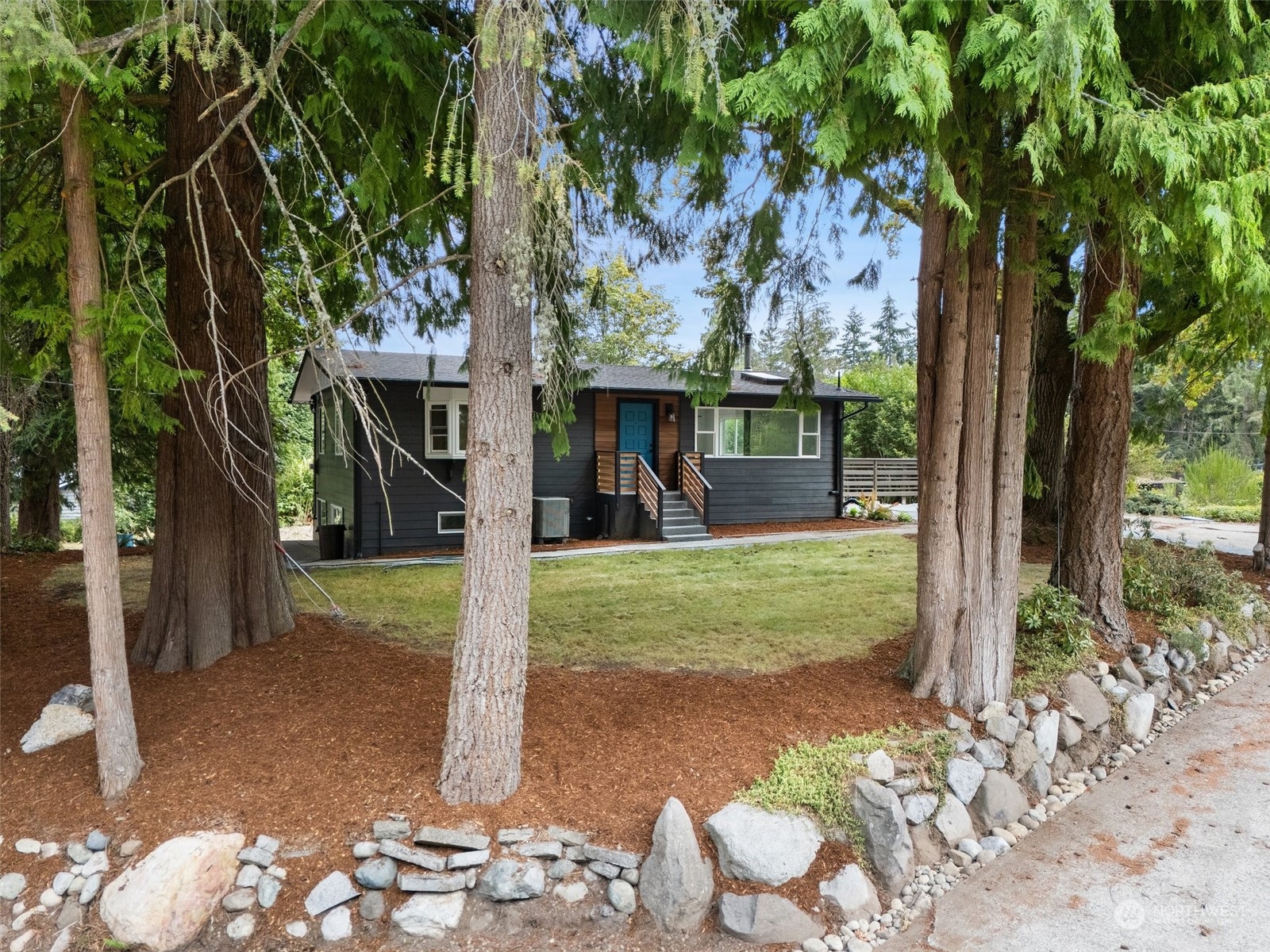 18832 196th Avenue Southeast Renton, WA 98058 - Photo 27 of 33 a view of a house with backyard and a tree
