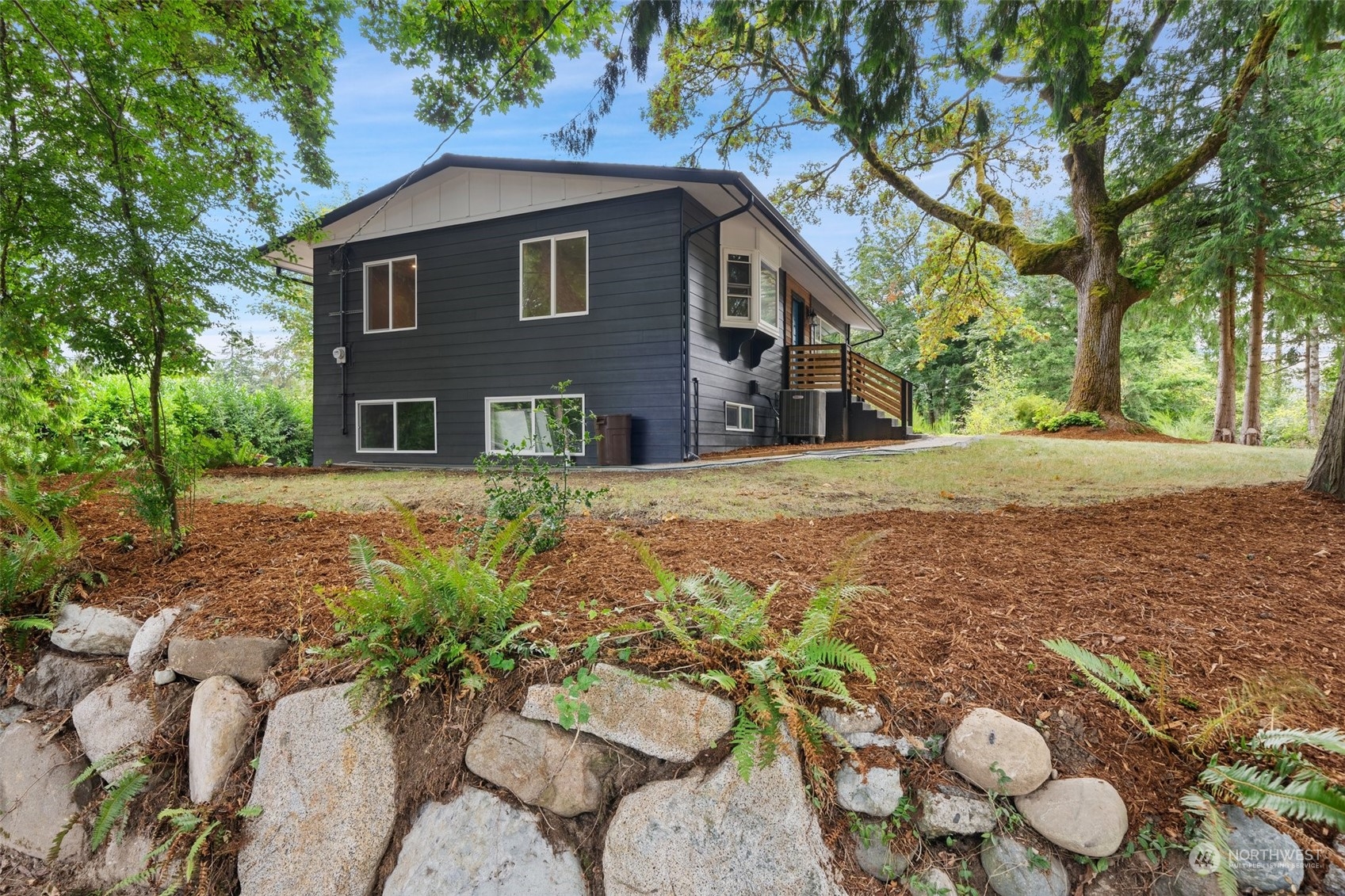 18832 196th Avenue Southeast Renton, WA 98058 - Photo 28 of 33 a front view of a house with a yard