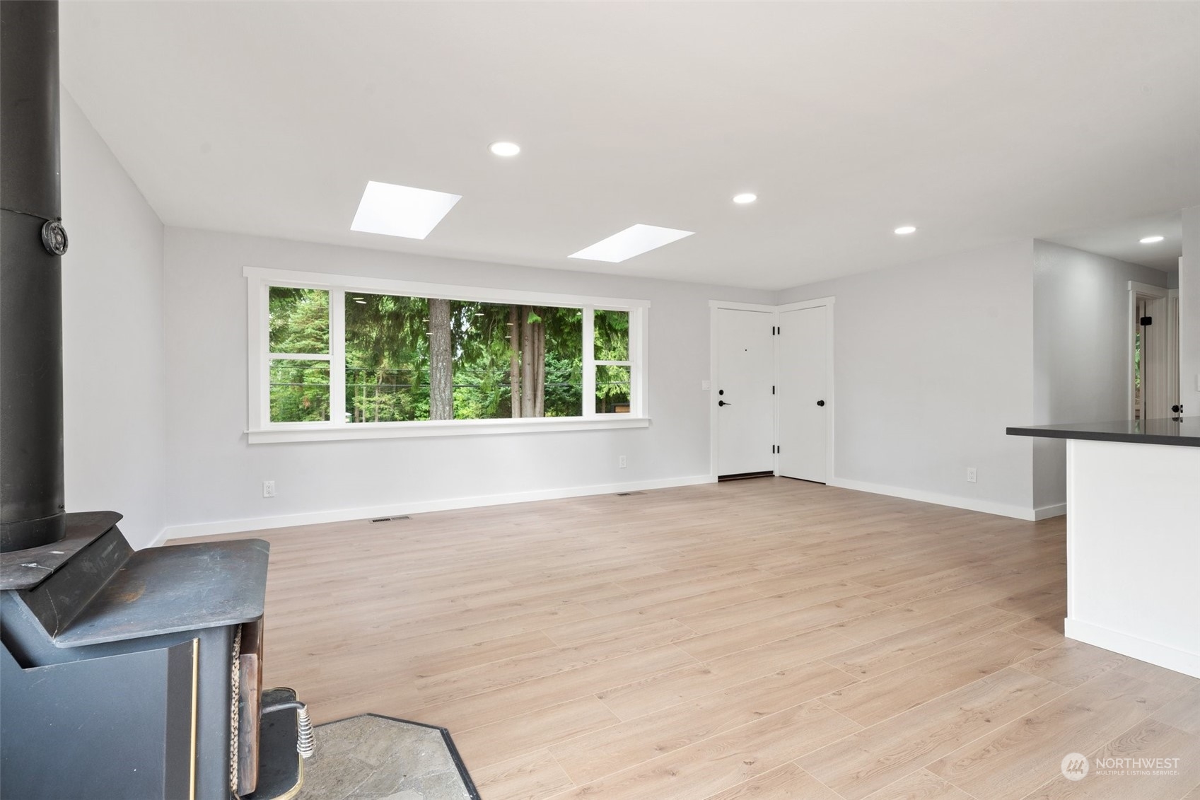 18832 196th Avenue Southeast Renton, WA 98058 - Photo 7 of 33 a view of an empty room with a window