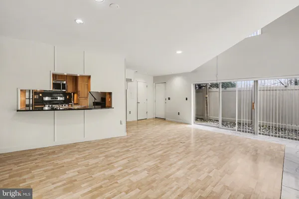 a view of a kitchen with a sink and a dishwasher cabinets