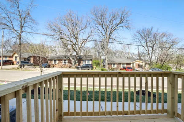 a view of a street with a house