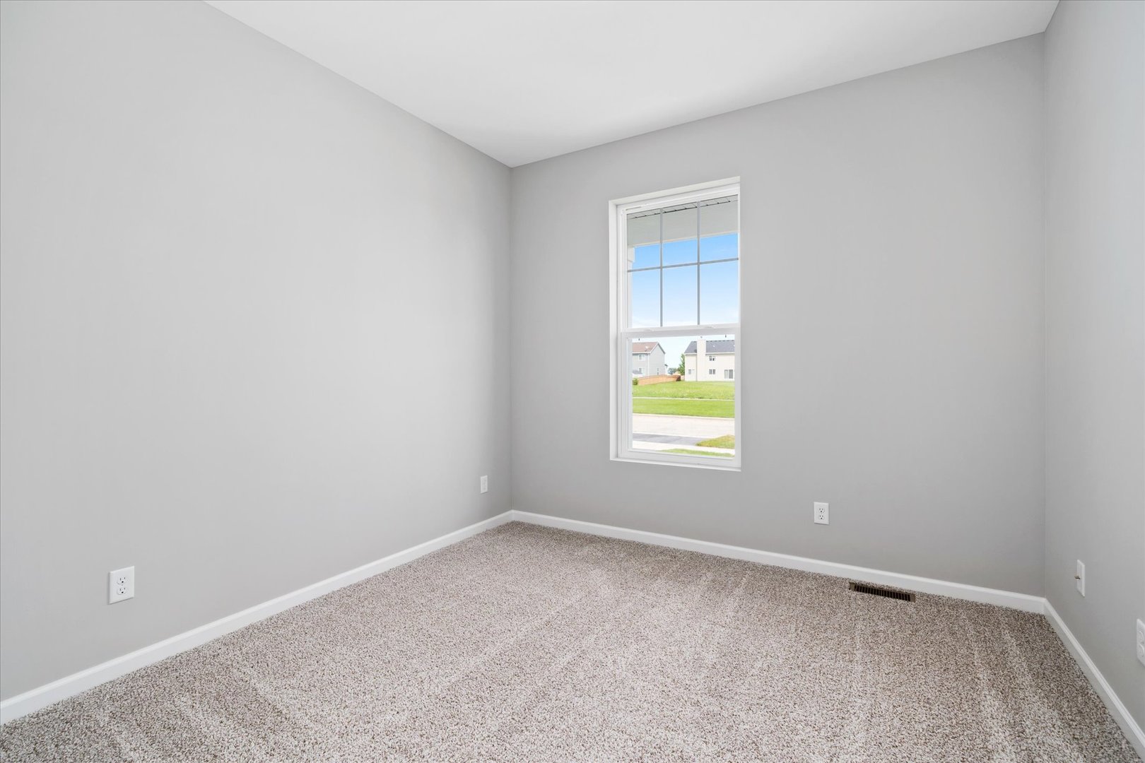 427 Riverbend Drive Genoa, IL 60135 - Photo 20 of 31 an empty room with a window