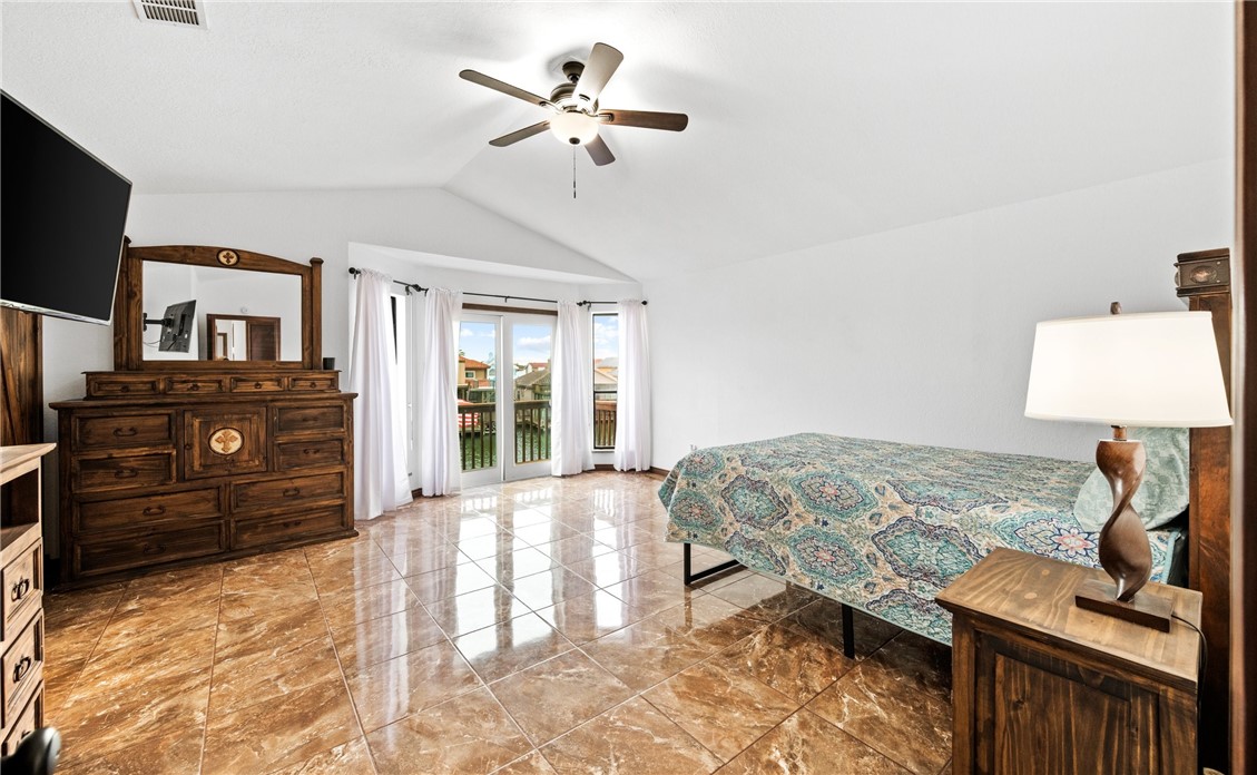15330 Key Largo Court Corpus Christi, TX 78418 - Photo 10 of 33 a living room with furniture and a flat screen tv