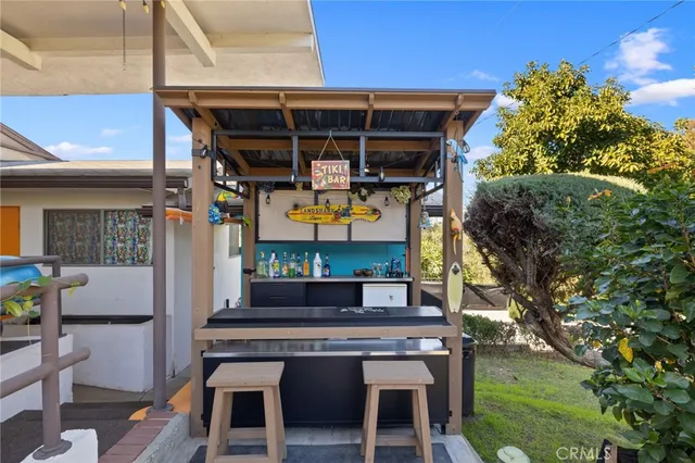 a room with furniture and a potted plant