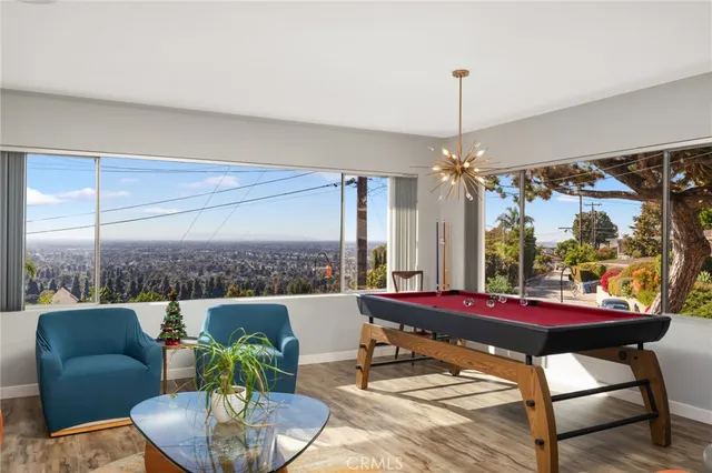 a outdoor sitting area with furniture and outdoor view